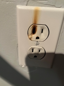 Scorch marks around outlet